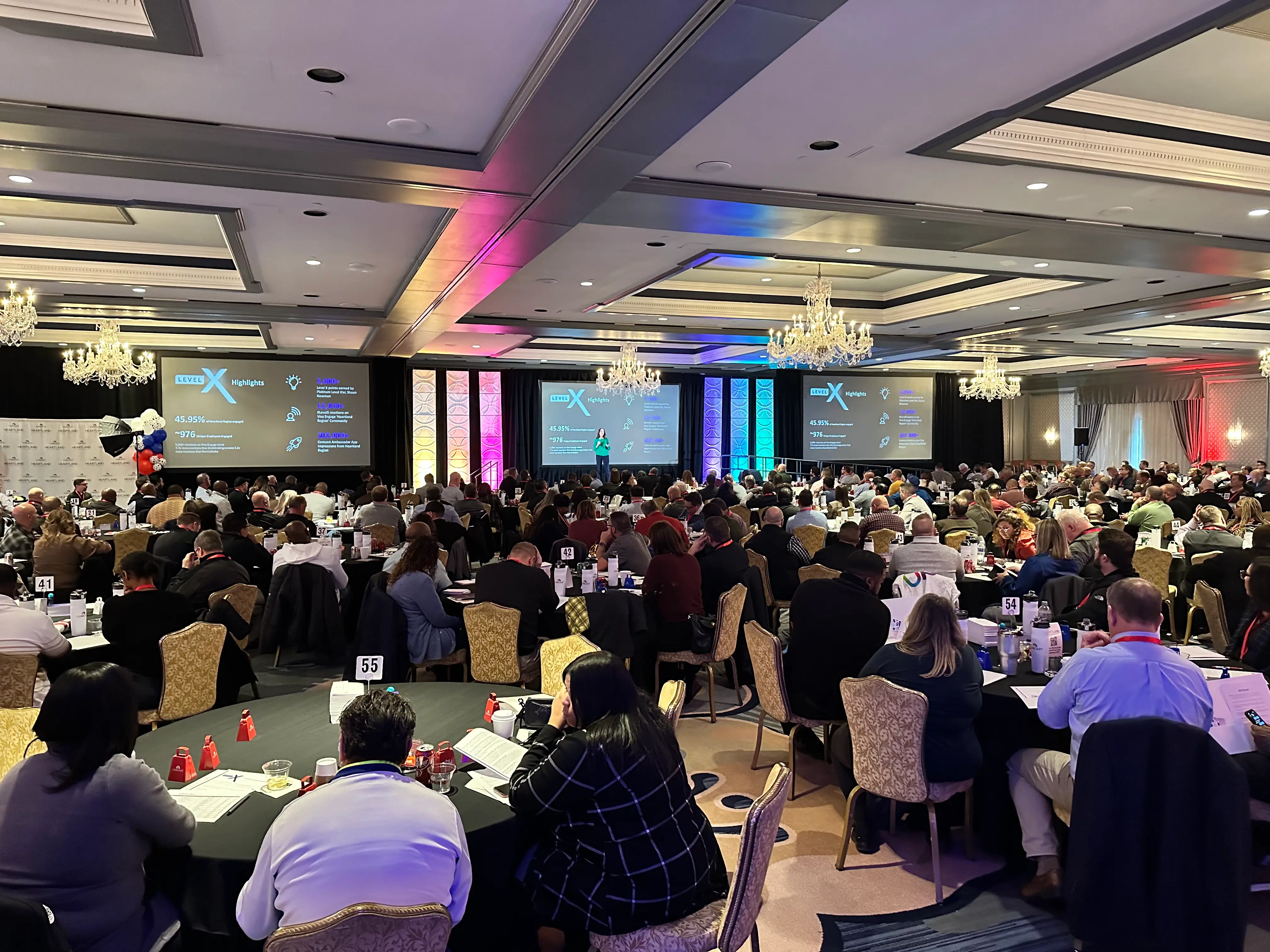 Event with projection screens and audio equipment
